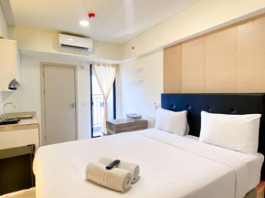 Modern Look Studio at Meikarta Apartment By Travelio